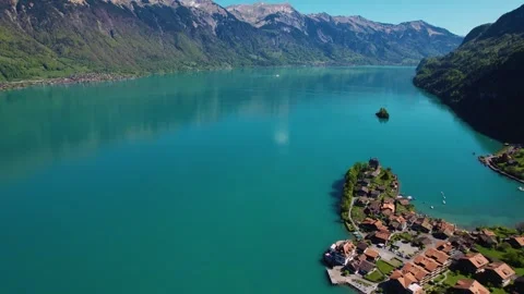 Aerial panoramic view around the town  Iseltwald  in Switzerland Stock Footage 308419230
