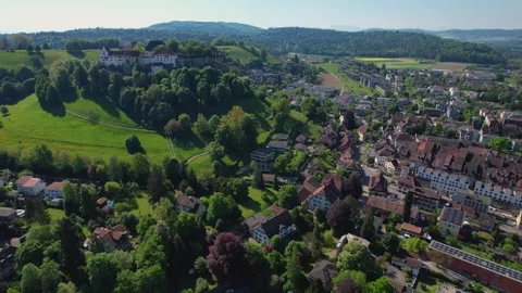 Aerial panoramic view around the town  Lenzburg  in Switzerland Stock Footage 308524746
