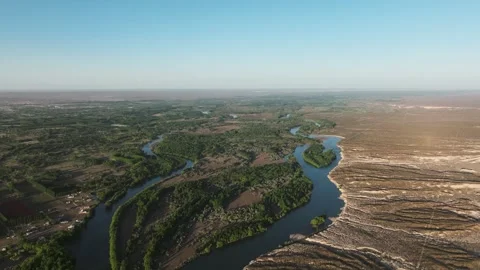 Aerial panoramic view of big valley with beautiful river in the middle of d.. Stock Footage 285146464