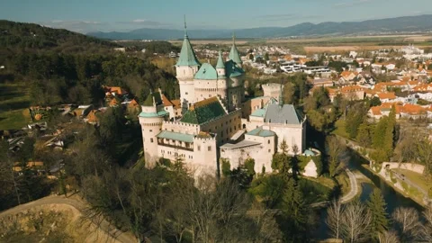 Aerial panoramic view of Bojnice Castle in Slovakia, birds eye scene of old Stock Footage 277549286