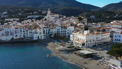 Aerial panoramic view of Cadaques Spain. seagulls fly close to the camera. Video Vídeo Stock 103604850