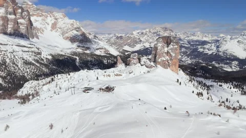 Aerial panoramic view of Cinque Torri Dolomites ski resort with mountain hut Stock Footage 286740181