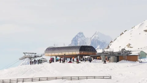 Aerial panoramic view crowded Tetnuldi upper lift station with skiers and s.. Stock Footage 329680534
