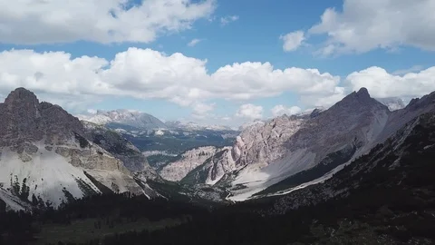Aerial panoramic view Dolomites Alpine mountains and valley Stock Footage 114355360