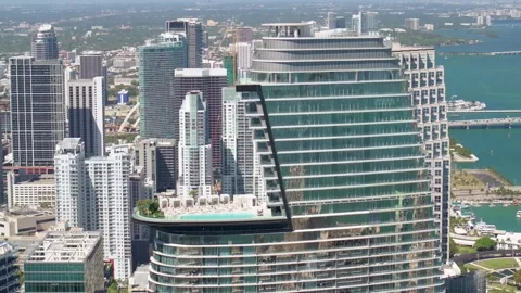 Aerial panoramic view of Downtown Brickell Miami skyline with rooftop pool 動画素材 314320028