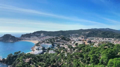 Aerial panoramic view from drone of  Tossa de Mar, mountains and big park, 4K Stock Footage 266937392
