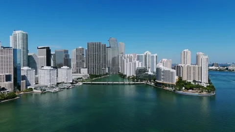 Aerial panoramic view of dynamic city skyline with Aston Martin Building in Stock Footage 255983677