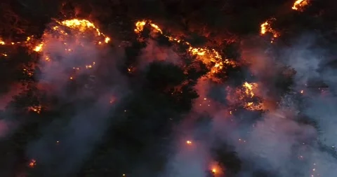 Aerial panoramic view of a forest fire at night, heavy smoke causes air Stock Footage 201932494