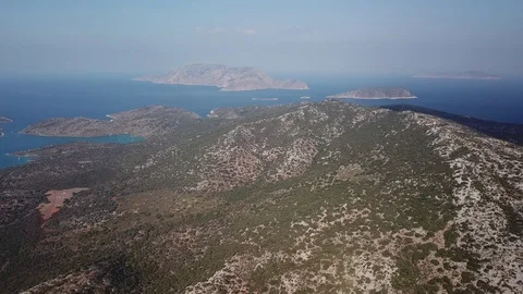 Aerial  panoramic view from high of a group of lonely mediterranean islands Stock Footage 96288465