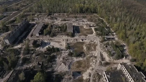 Aerial panoramic view of industrial terrain with abandoned buildings. Video stock 80979130