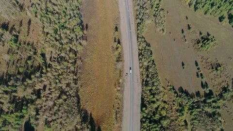 Aerial panoramic view of an intercity road between green trees. Beautiful Stock Footage 167301074