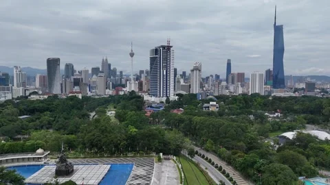 Aerial panoramic view of Kuala Lumpur with green parks and famous buildings. Stock Footage 296090747