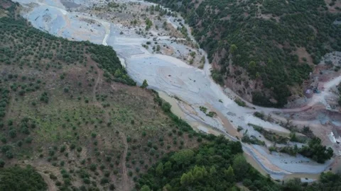 Aerial panoramic view of a large river winding through forested hills Stock Footage 343960644