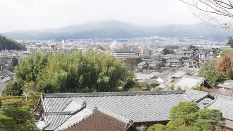 Aerial panoramic view with many roofs on buildings  of ancient Kyoto city i.. Stock Footage 286312669