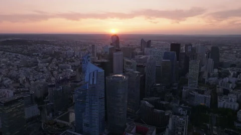 Aerial panoramic view of metropolis at sunset. Futuristic La Defense district Stock Footage 252754137