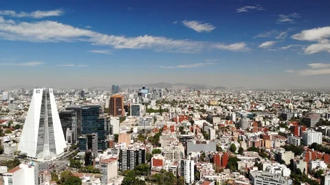 Aerial panoramic view of Mexico City, CDMX, with drone flying sideways and a Vídeos de archivo 123750308