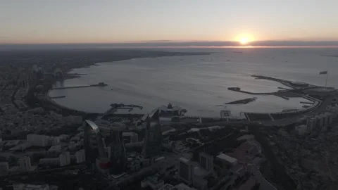 Aerial Panoramic View of Modern Cityscape and Ocean Harbor at Sunset Stock Footage 341883670
