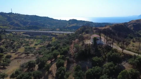 Aerial panoramic view of mountain highway overpass at sunset Stock Footage 343960718