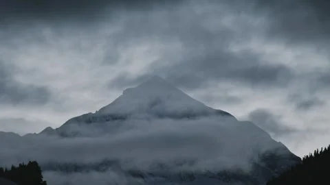 Aerial panoramic view Mountain peak timelapse wrapped in low clouds, dramat.. Stock-Footage 329614920