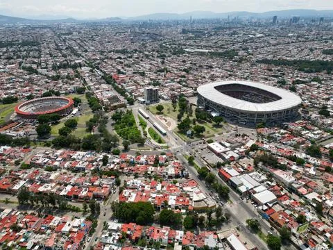 Aerial panoramic view of Nuevo Progreso bullring and Jalisco Stadium Foto stock