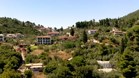 Aerial panoramic view over Stafylos town in the southern part of the Skopelos Stock Footage 153323744