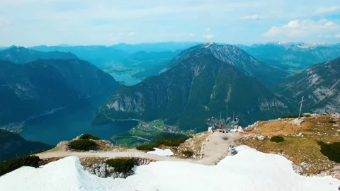 Aerial panoramic view of paragliders fly from the snowy mountains in Austria. Stock Footage 87183053