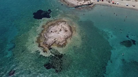 Aerial panoramic view of Pavlopetri islet near Pounda exotic beach in Lakonia Stock Footage