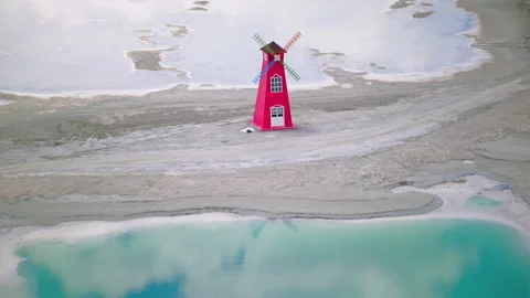Aerial Panoramic View of Red Windmill Landmark in Dachaidan Emerald Lake Stock Footage 341861133