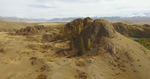 Aerial panoramic view of river running between green rocks and banks against Stock Footage 90024863
