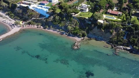 Aerial panoramic view of rocky platform and luxury hotels in Greece Stock Footage 343939468