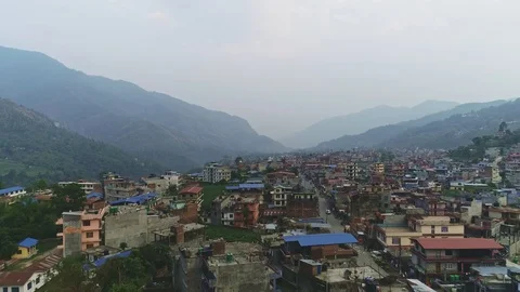 Aerial panoramic view of small town over misty river valley Stock Footage 124676745