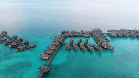 Aerial panoramic view of some floating resorts of Mabul, MALAYSIA. Shot in 4k Stock Footage 90486659