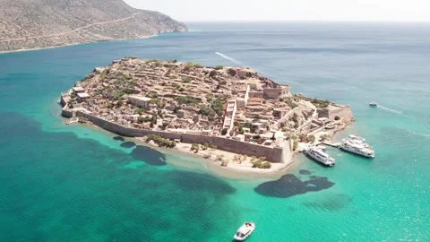 Aerial panoramic view of Spinalonga fortress island and turquoise sea Stock Footage 337047356
