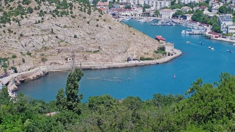 Aerial panoramic view of the top of mountains and blue sea in slow motion Stock Footage 85103095
