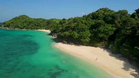 Aerial Parallax of Puka Shell Beach Boracay with Swimmers in Turquoise Water Stock Footage 335210047