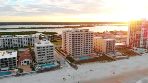 Aerial Parallax Sunset over Daytona Beach Condos Stock Footage