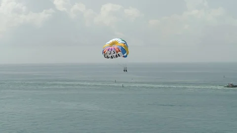 Aerial parasiling with cargo ship in background epic footage 스톡 동영상 93570687
