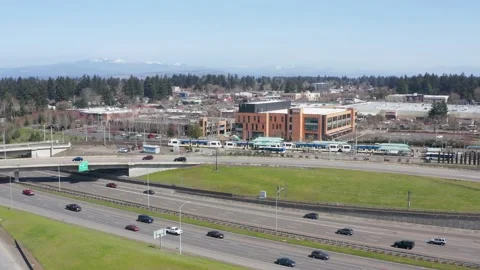 Aerial of passenger train stopping at a train station in Portland Oregon. Stock-Footage 161623928