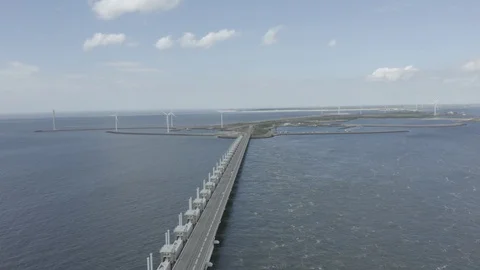 Aerial passing the Oosterscheldekering, a dutch storm surge barrier in 4k Stock Footage