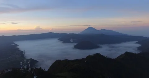 Aerial Pastel Sunrise of Active Volcano, Bromo Mountain, East Java Stock Footage