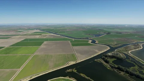 Aerial patchwork crops irrigation aqueduct America farming landscape Stock Footage 91544614