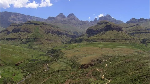 Aerial of path going through the lush mountain ranges, Fast Flight Up To Orange Stock Footage 109441461