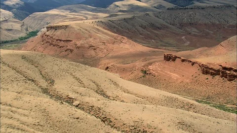 Aerial of path through mountains, Red Rocks By Wind River Stock Footage 109466867