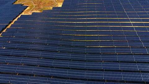 Aerial pattern of blue solar panel array. Symmetrical and repetitive pattern of Stock Footage 329192244