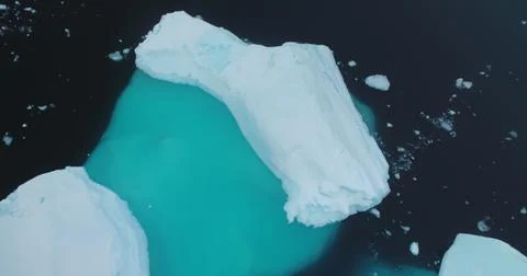 Aerial pattern massive icebergs float cold water Stock Photos