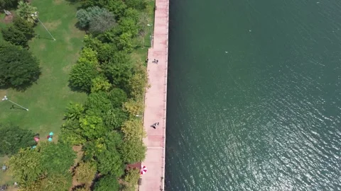 Aerial pedestrian path by the sea Stock Footage 204807997