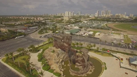 Aerial. Pegasus and Dragon. Massive bronze sculpture. Hallandale, Florida. 4k Stock Footage 76435050