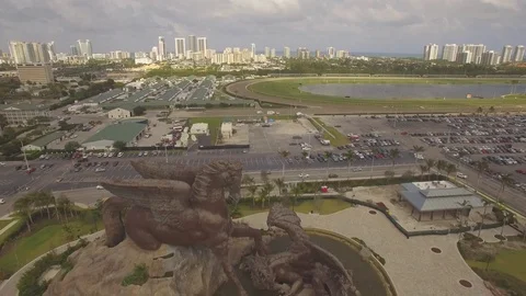 Aerial. Pegasus and Dragon. Massive bronze sculpture. Hallandale, Florida. 4k Stock Footage 76435152