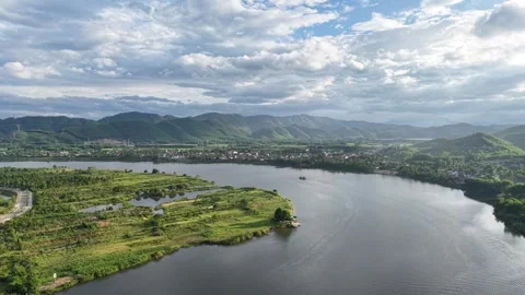 Aerial of Perfume River bend with forested mountains 4K Stock Footage 339862990
