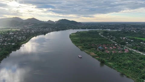 Aerial of Perfume River with rice fields and mountains 4K Stock Footage 339864247
